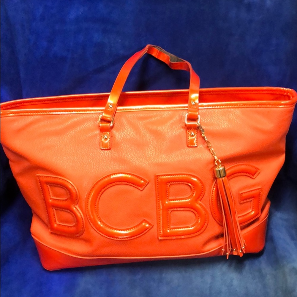 BCBG used bag with handle damage.